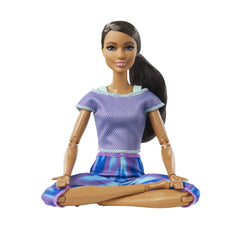 Barbie Made to Move doll with curly brunette ponytail inspires versatile styling.