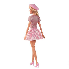 Barbie doll with beret and hair bow, perfect for fashion-inspired play.