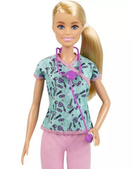 Barbie nurse doll wearing scrub top with medical-tool print encourages caring-play storytelling