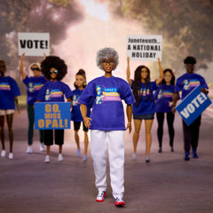 Barbie Opal Lee in blue Unity Walk tee ready for gifting or display.