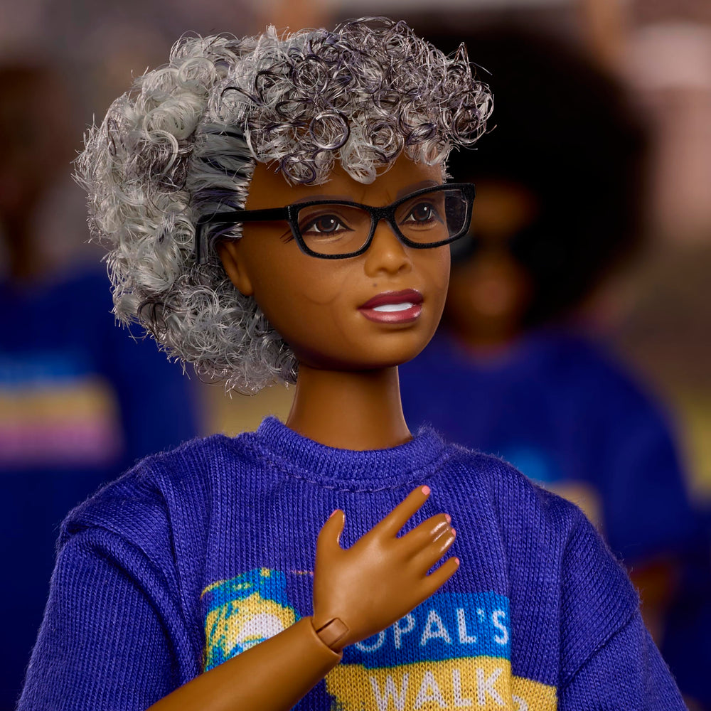 Barbie Opal Lee wearing white pants for a complete, display-ready look.
