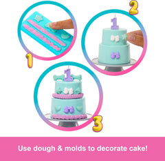 Barbie Party Unboxed two-tier cake shows decorations for party plays