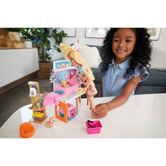 Barbie pet boutique checkout counter enabling pretend shopping and rewards-like play.