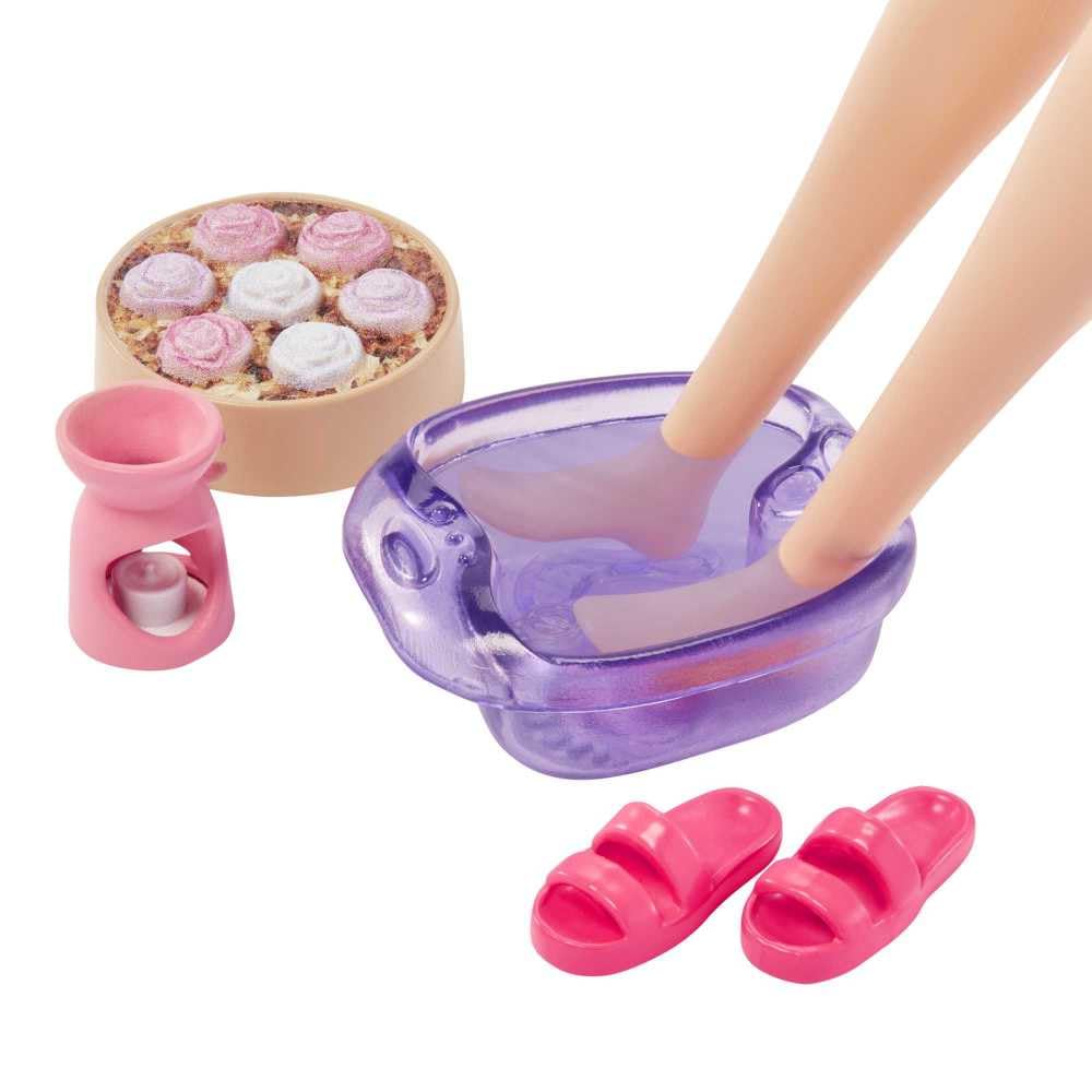 Barbie puppy with pink eye mask enhances nurturing pretend play.