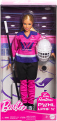 Barbie PWHL doll in skates, gliding across imaginary ice for creative fun.
