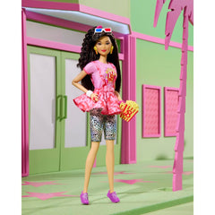 Barbie Rewind doll with black hair scrunchie highlights 80s styling for collectors.