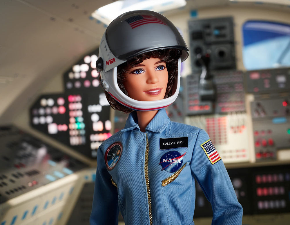 Barbie Sally Ride with removable helmet showcasing Challenger and NASA logos for authentic display