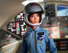 Barbie Sally Ride with removable helmet showcasing Challenger and NASA logos for authentic display