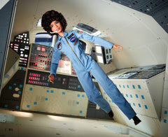 Barbie Sally Ride doll stands with Certificate of Authenticity for collection display