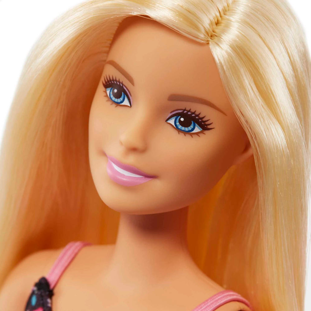 Barbie Shopping Time doll in a black dress with pink flowers