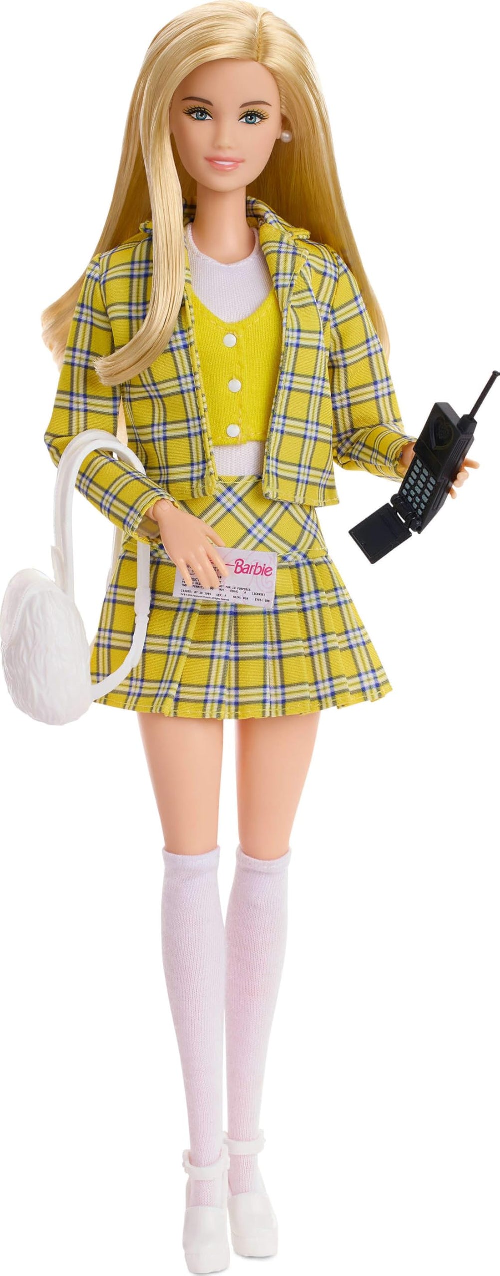 Barbie Signature Cher pleated skirt and blazer detail emphasizes retro styling.