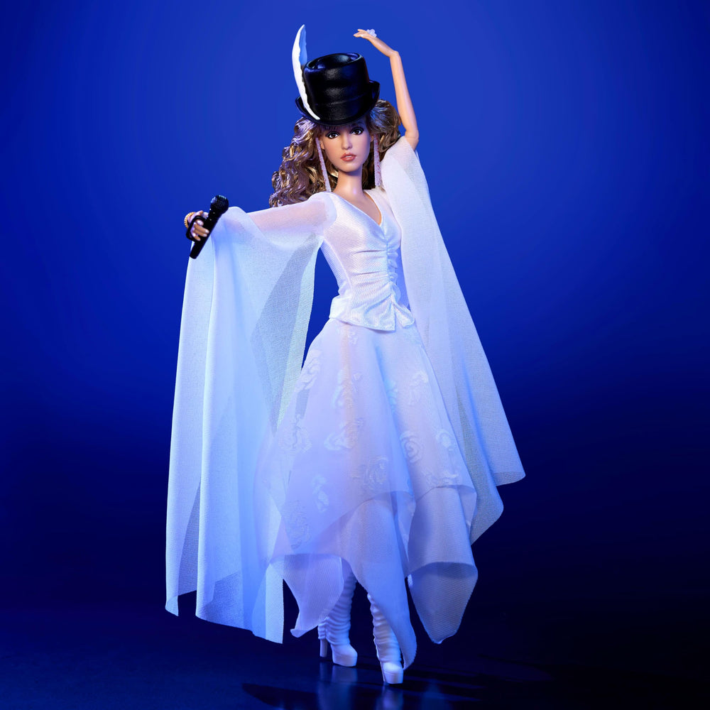 Barbie Signature Stevie Nicks boots and earrings complete a stage-ready look.