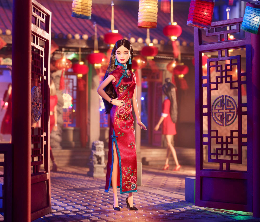 Doll with teal trim and peony print adds luck and style to Lunar New Year collections.