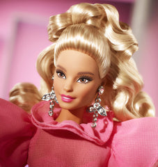 Barbie silvery rhinestone earrings add sparkle to the look.
