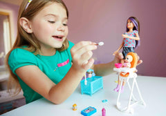 Barbie Skippers Babysitters Inc color-change baby doll face demonstrates cleaning and mess-play fun