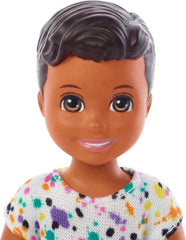 Barbie Skipper Babysitters Inc doll holding handles enhances interactive feeding play.