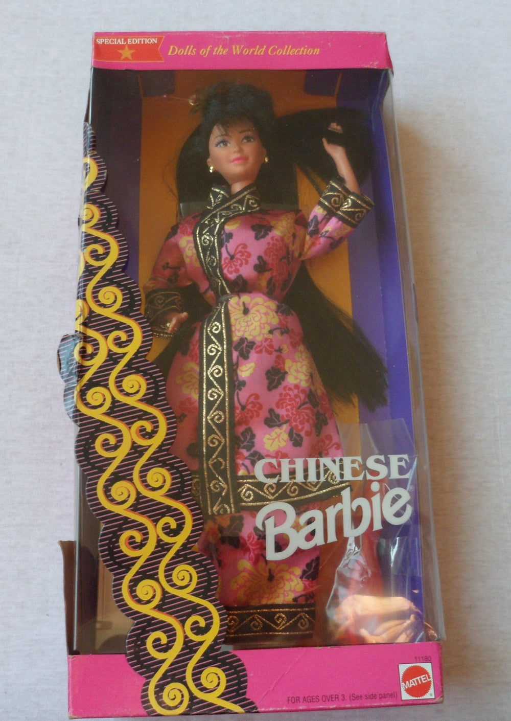 Barbie Special Edition Chinese Barbie doll in pink robe, ideal for display and cultural storytelling.
