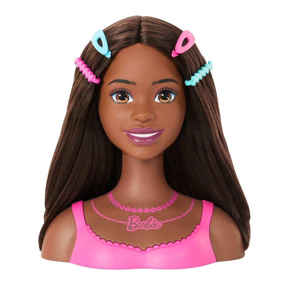 Barbie Styling Head featuring flower barrettes for playful looks.