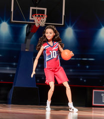 Barbie Sue Bird doll with basketball under arm for authentic action moments.