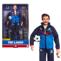 Barbie Ted Lasso doll in blue tracksuit with AFC Richmond logo for display