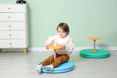 BARNEY KAITE BS Spinner-X blue sit-and-spin action for motor-skill practice at home.