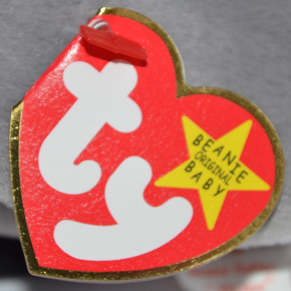 Close-up of Beanie Babies Loosy the Goose head and eyes showing precise stitching.
