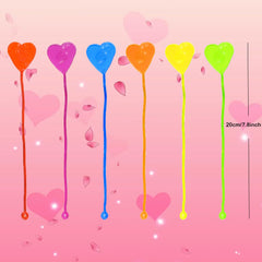 BEIGUO yellow heart-shaped sticky hand with card — easy-to-clean fun for playtime.