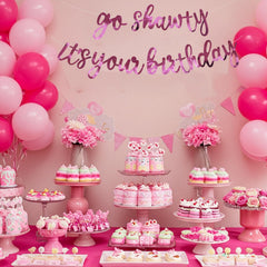 BEISHIDA pink party banner doubles as a photo backdrop.