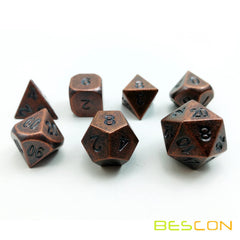Bescon antique copper dice on a gaming table during an RPG night.