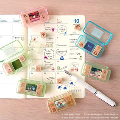 Beverly Ghibli case with four mini stamps for travel and storage