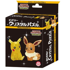 Beverly Pikachu Eevee crystal puzzle pieces close-up catching light for display.