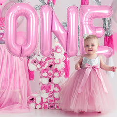 Biapian birthday decor balloon provides a milestone centerpiece.