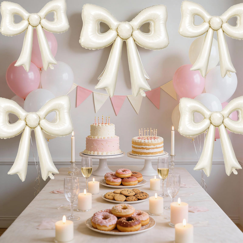 Biapian cream bow balloon paired with ribbons for celebratory decor.
