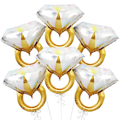 Biapian diamond ring balloons assembly for romantic engagement decor.