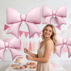 Biapian pink bow balloon with straw for easy inflation.