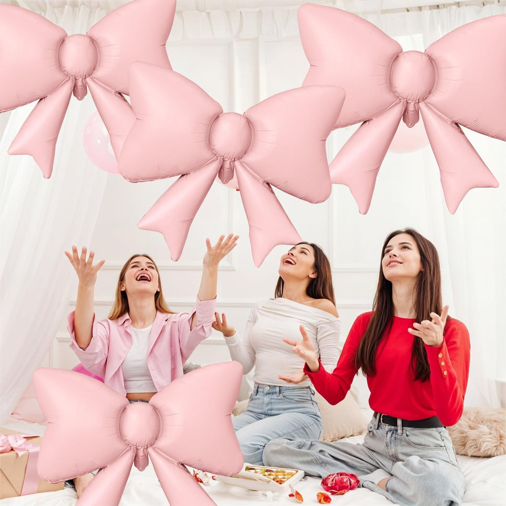 Biapian pink bow balloon decor for walls or ceilings.
