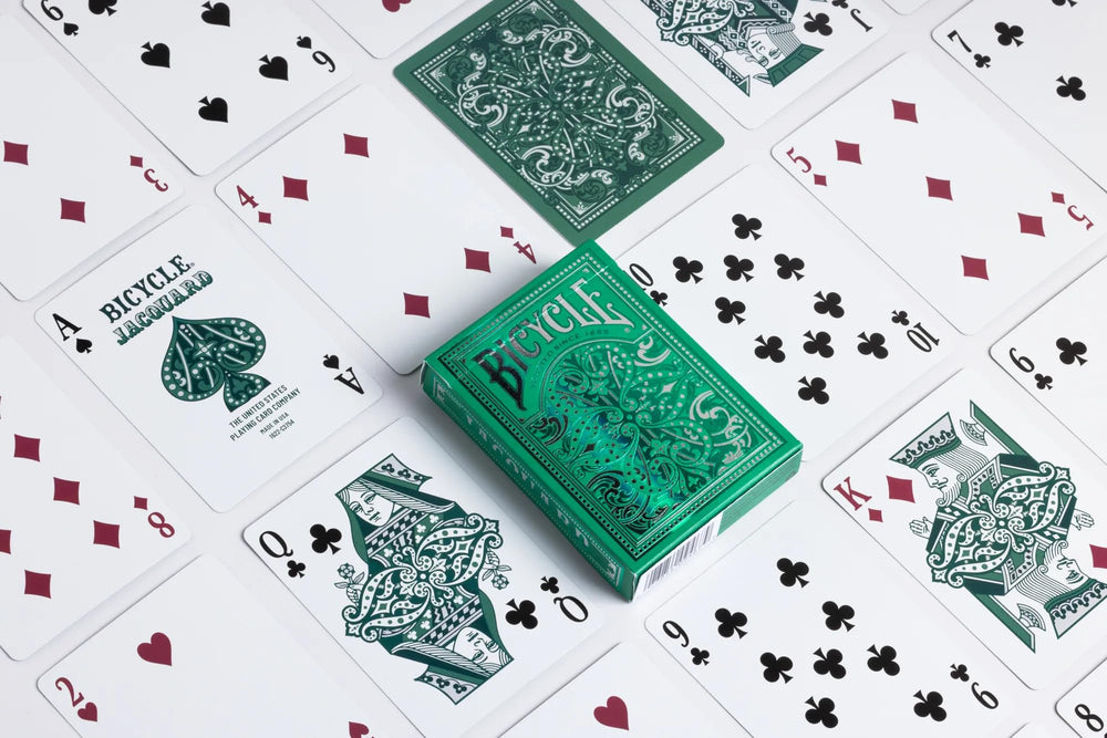 Card backs of Bicycle Jacquard feature woven-inspired design in silver and green