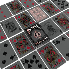 Bicycle Metalluxe Black Rose Gold deck foil closeup with shimmer.