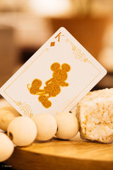 Hand holding cards with Air Cushion Finish for smooth handling.