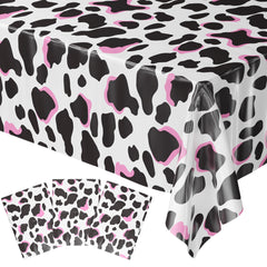 Blue Orchards cow print table cover for barnyard party decor and easy cleanup