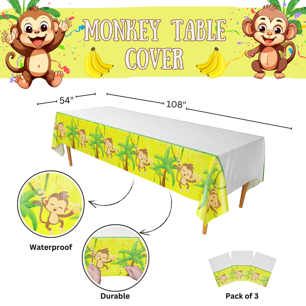 Blue Orchards Monkey Party Tablecovers laid out on a table for a festive setup.