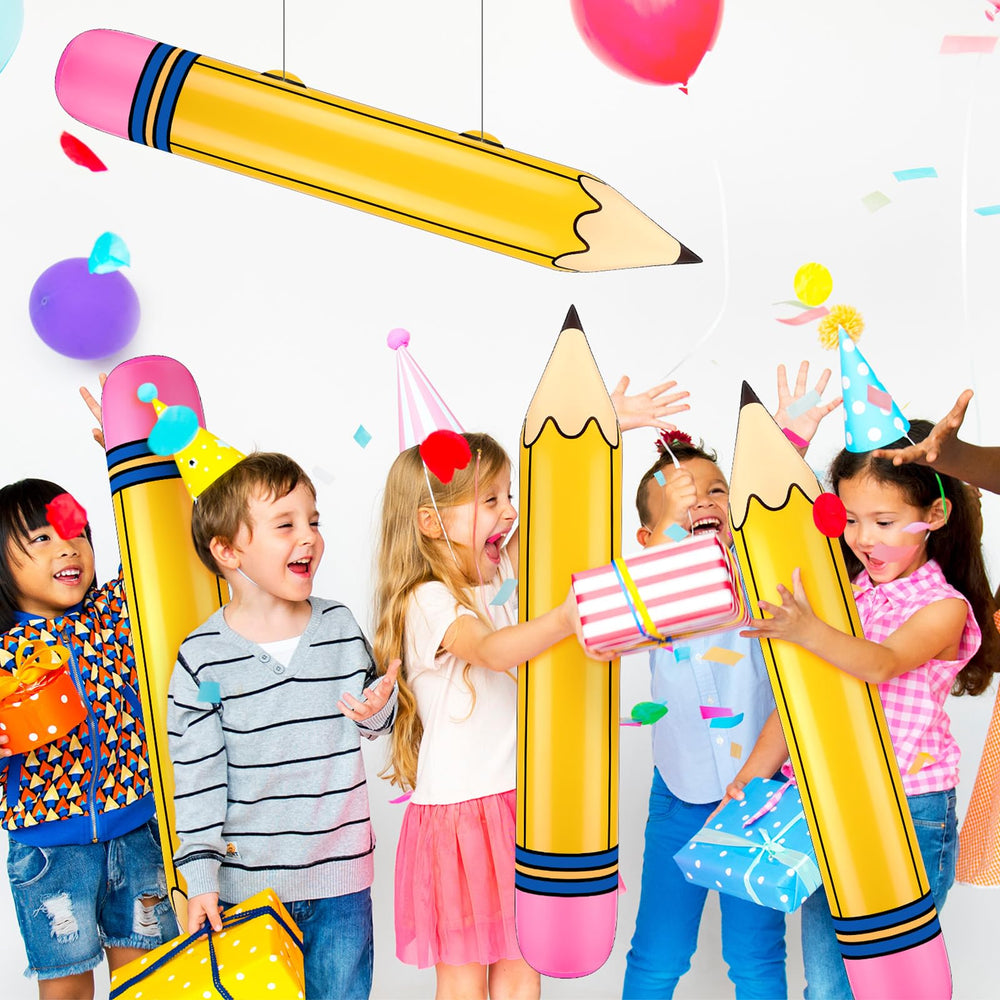 Blueweenly 27-inch inflatable pencils used as a colorful first-day photo prop