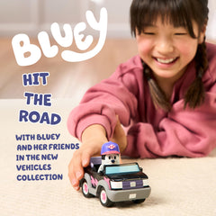 Bluey Muffin figurine with articulated arms and mechanic hat for interactive play.
