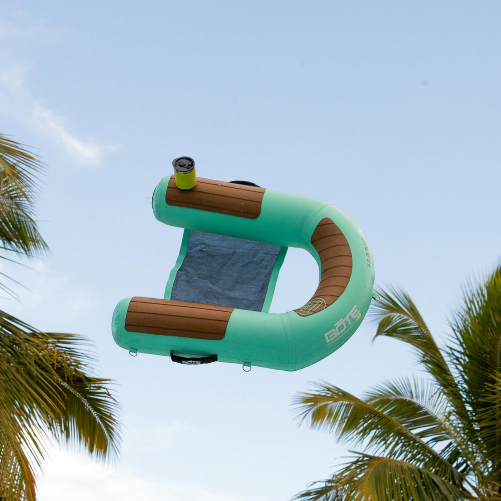 BOTE Hangout Sling Chair with DockLink closeup, drinks kept nearby during use.