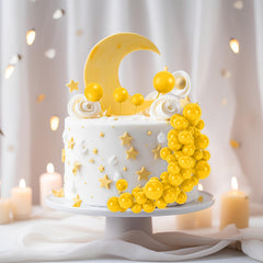 BOUBONI yellow toppers on cupcakes for bright party styling.