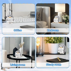 BOXOB penguin doll with smiling face, ideal desk companion.