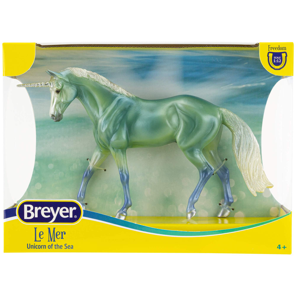 Breyer Le Mer shines on shoreline with silver hooves for dynamic display.