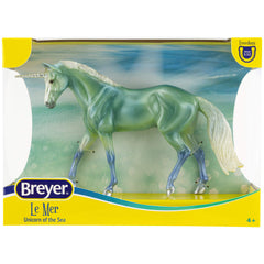 Breyer Le Mer shines on shoreline with silver hooves for dynamic display.