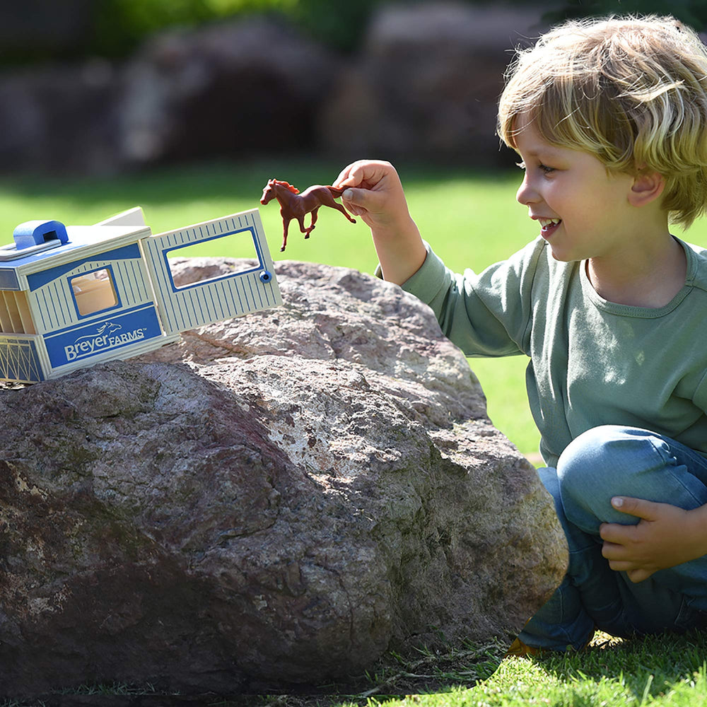Six hand-painted Breyer Stablemates horses included for complete storytelling.