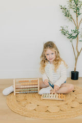 Brooklyn Neutral Xylophone neutral colors suit a boho nursery.